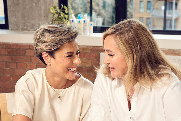 Two women looking at eachother