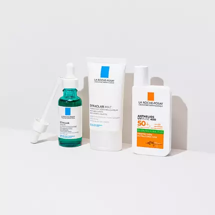 Three skincare products from La Roche-Posay: a green serum with a dropper, a white cream tube labeled "Effaclar Mat," and a white sunscreen bottle with SPF 50.