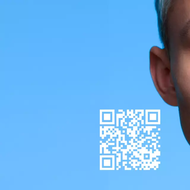 A close-up of a young person's face next to a smartphone displaying a digital representation of their face, with a QR code in the bottom left corner and a solid blue background.