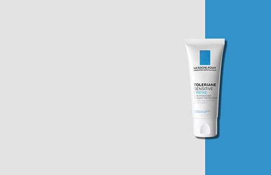 A tube of La Roche-Posay Effaclar Acne Treatment with a clean, minimalist design, set against a contrasting background of light gray and blue.