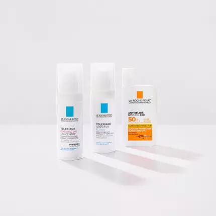 Three La Roche-Posay skincare products are displayed on a light background: two white bottles labeled "Toleriane Sensitive" and "Toleriane Concentrate," and one orange and white bottle labeled "Anthelios Ultra-Light."