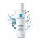 A bottle of La Roche-Posay Thermal Spring Water, surrounded by splashes of water, highlighting its soothing and antioxidant properties for sensitive skin.