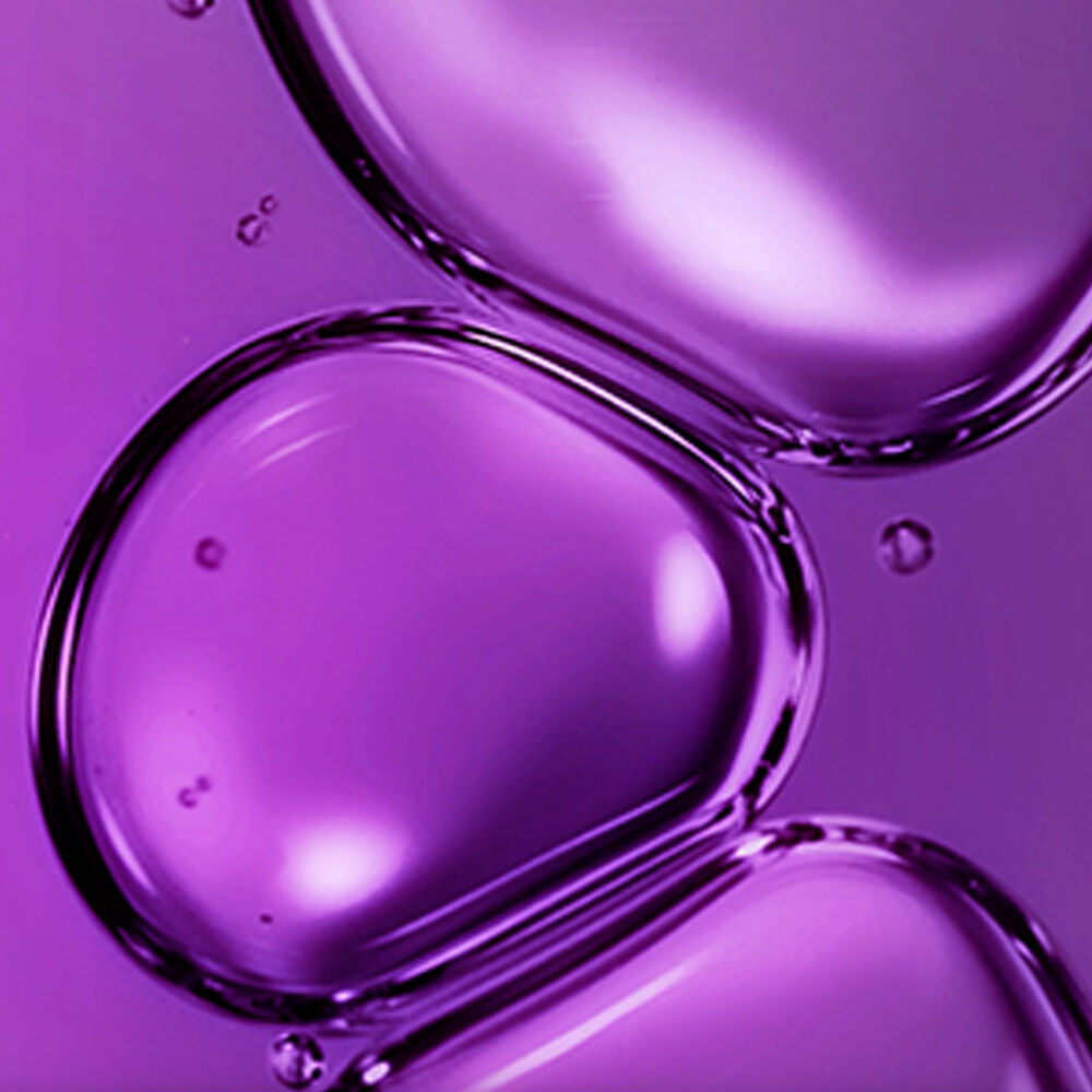 Close up of niacinamide ingredient with large purple bubbles