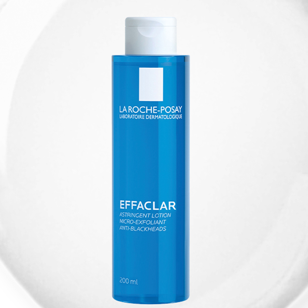 La Roche-Posay Effaclar Clarifying Lotion against a clear texture image