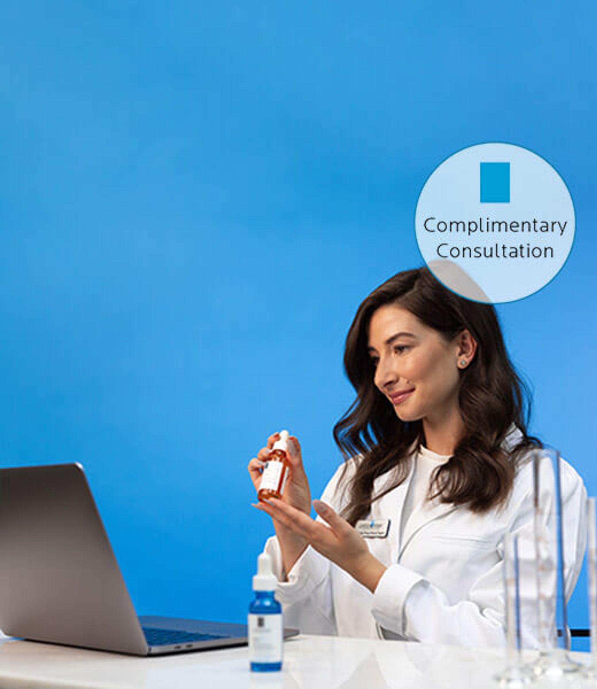 A woman in a lab coat holds a skincare product while consulting online via laptop, with a blue background and consultation label.