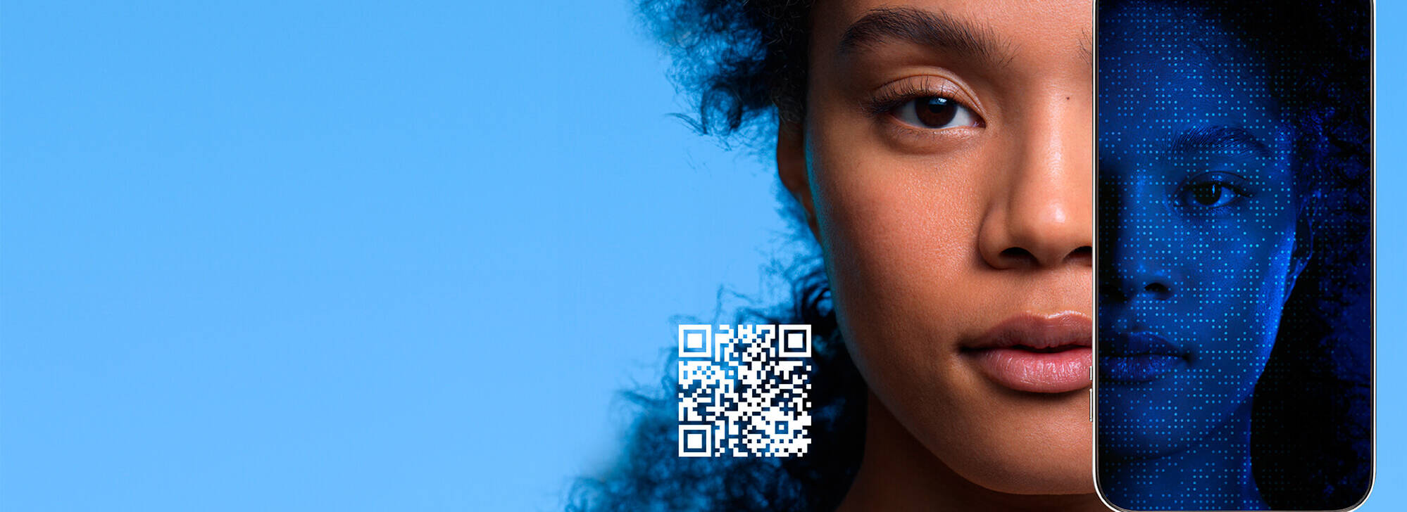 A close-up of a young woman with curly hair beside a smartphone displaying a QR code and a digital face overlay.