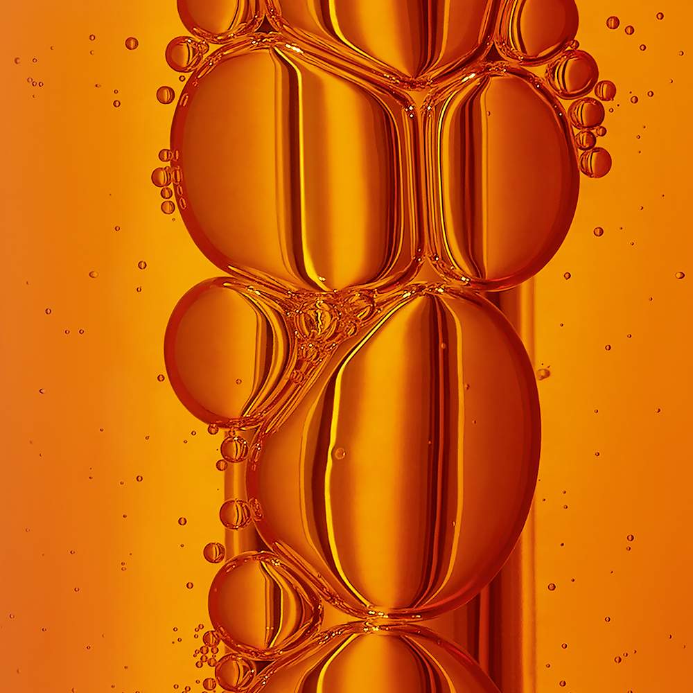 Close up of vitamin c – bubbly and orange